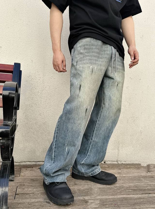These Margiela distressed men's elastic waist drawstring jeans are a must-have f