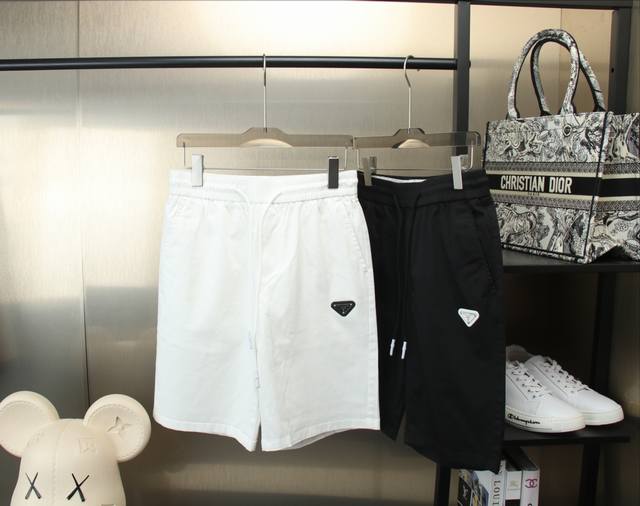 Long Prada classic versatile Bermuda shorts with elastic waist and contrasting h