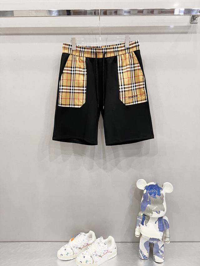 Kk Burberry custom space cotton shorts with plaid elements, logo patchwork and e