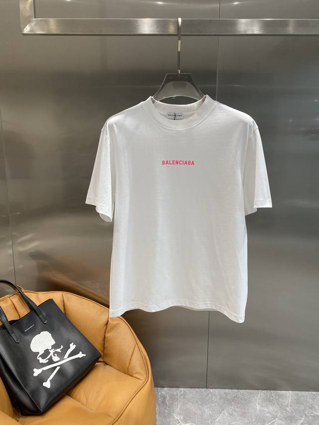 Parisian Balenciaga black T-shirt, cool summer trend. The black body is classic