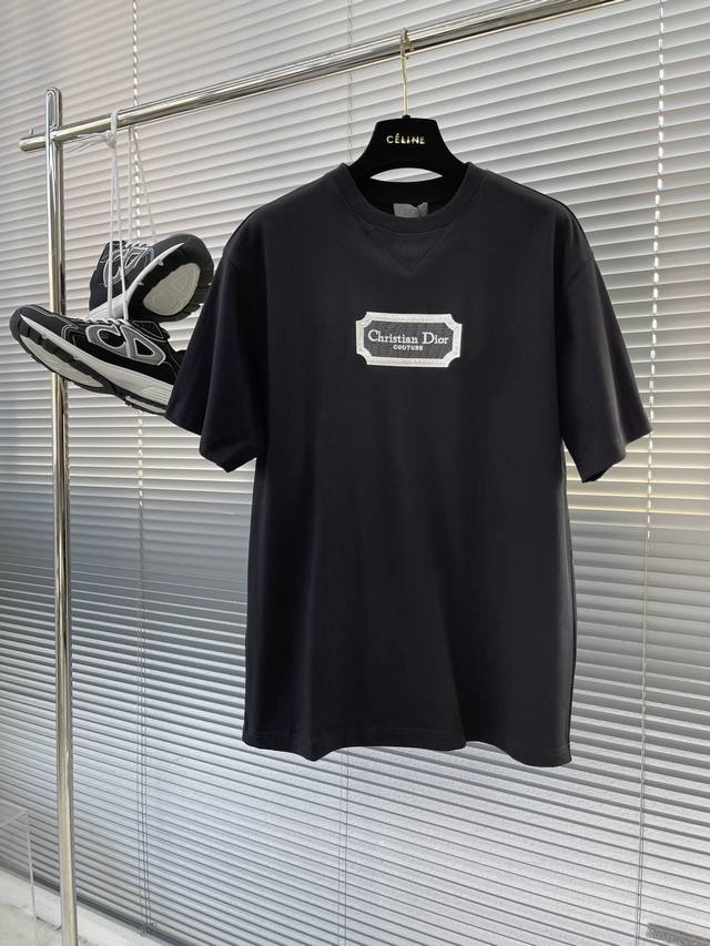 Dio Couture razor-strip embroidered T-shirt. This style is made from custom-wove