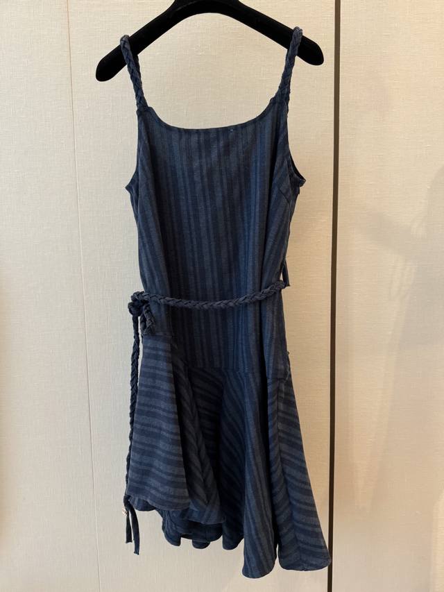 Cc Chane's new irregular hem slip dress is made of custom fabric in a retro blue
