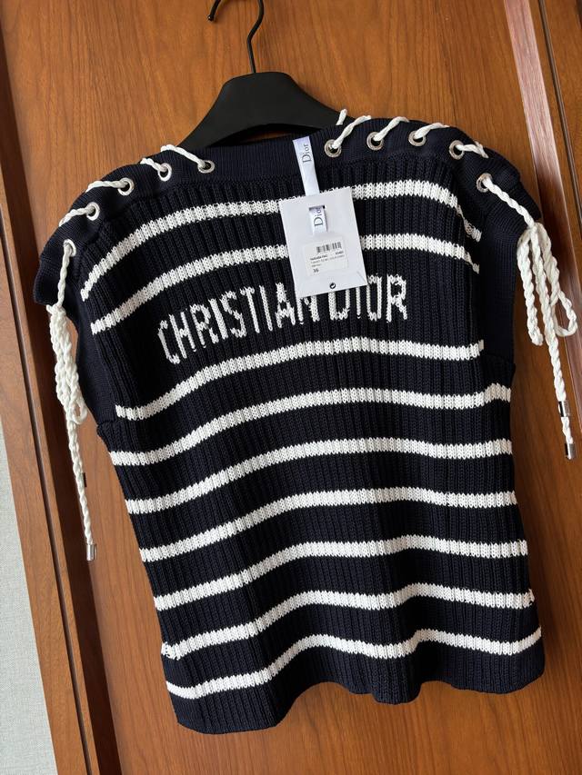 New Arrival! Who knows?! This sleeveless knit from Dio* perfectly captures the e