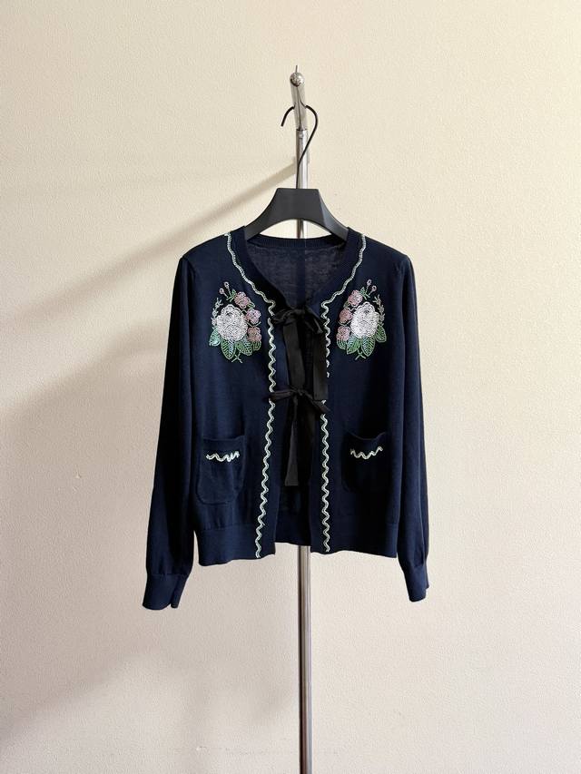 V's retro beaded lace-up cardigan, fully hand-sewn with beading and a vintage bo