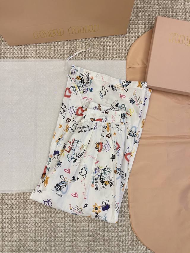 Aim Sh New arrival: cartoon painted pattern elastic waist wide-leg pants. A vers