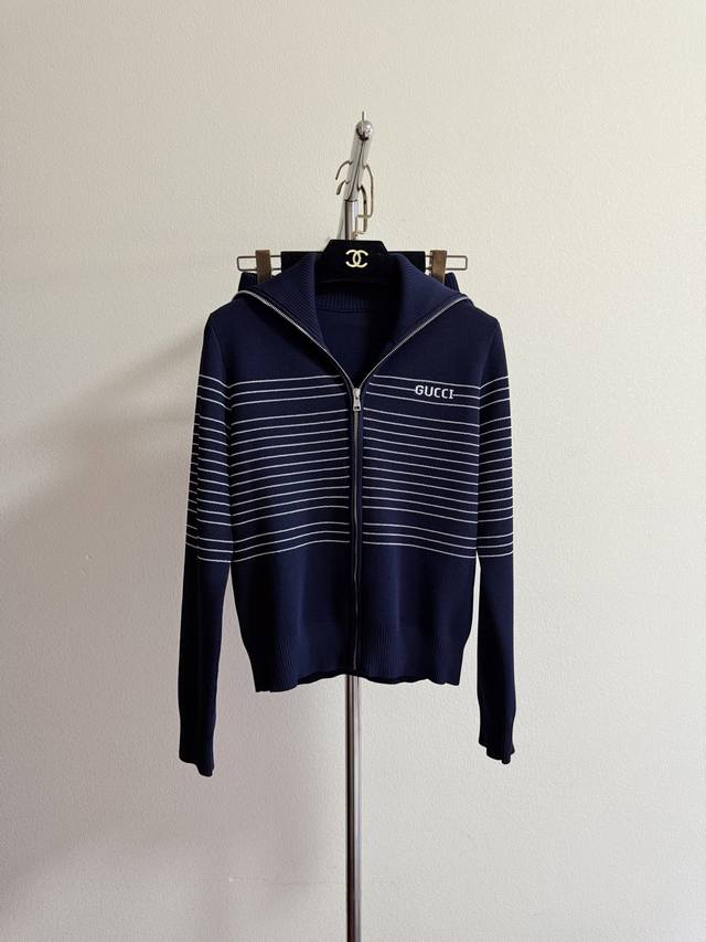 Gucc navy blue preppy jacket with heavyweight curved beaded lapels and zippers.