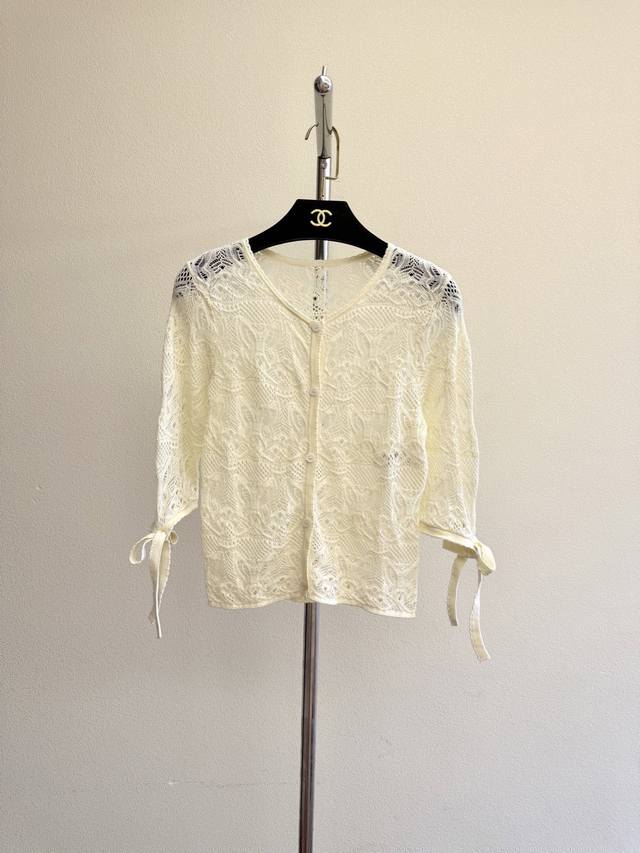 Dio Butterfly Hollow Lace Cardigan. The yarn is custom-dyed in beige and apricot
