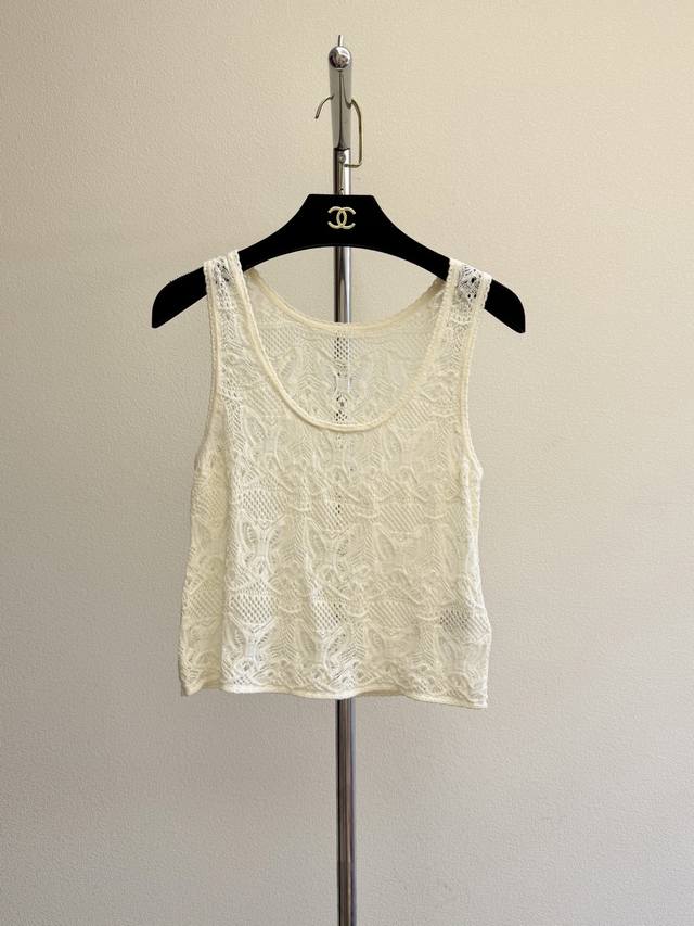 Dio Butterfly Hollow Lace Vest. The yarn is custom-dyed in beige and apricot. Th
