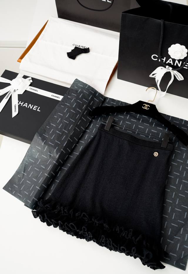 C*Hanel 25 Ruffled Skirt Who can resist the sweet critique of a skirt! It's a he