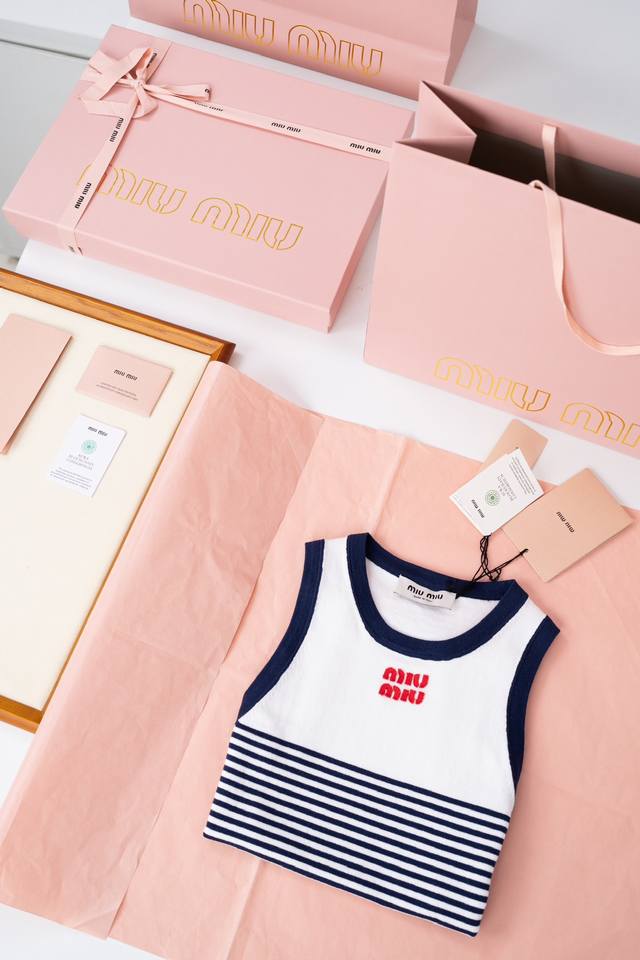 2025A New Product - Mium Iu Striped Knitted Vest has a navy-style striped elemen