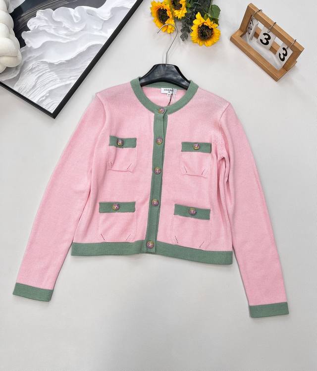 Chanel's classic, revitalized four-pocket contrast-color knitted cardigan. A sof