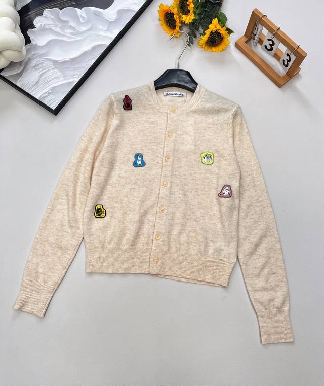 Acne Moomin's new autumn/winter collaboration knitted cardigan. This regular, cr