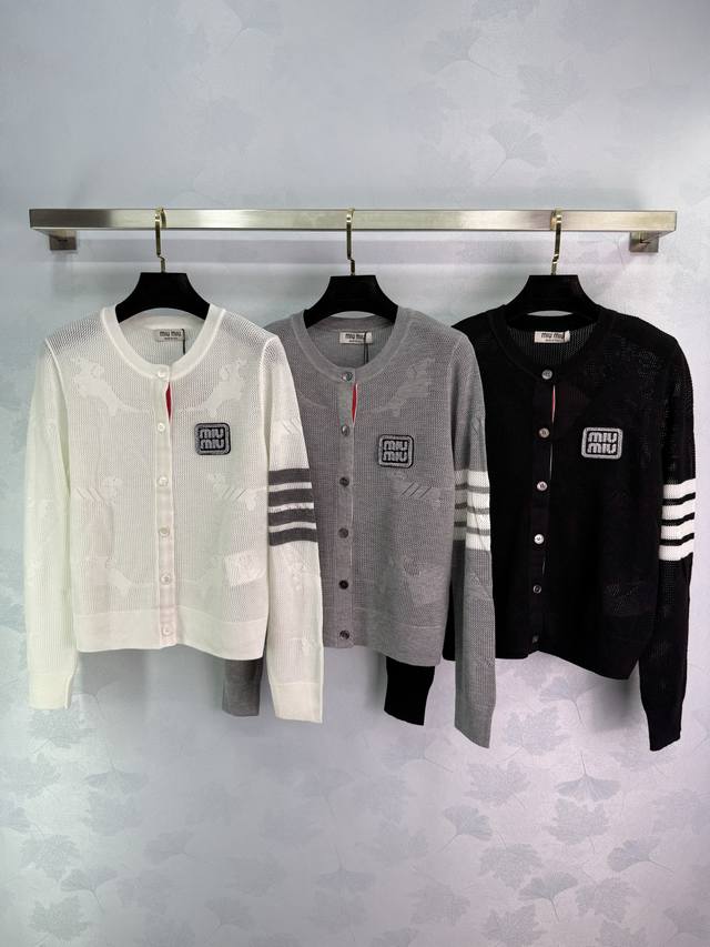 Miumi*'s latest 2025 Early Fall collection! A round-neck, hollow-knit, long-slee