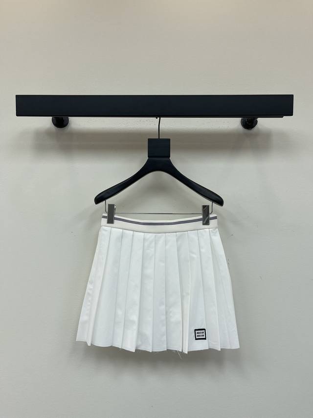 Miumi*25 Early Fall new collection featuring a high-waisted pleated skirt with a