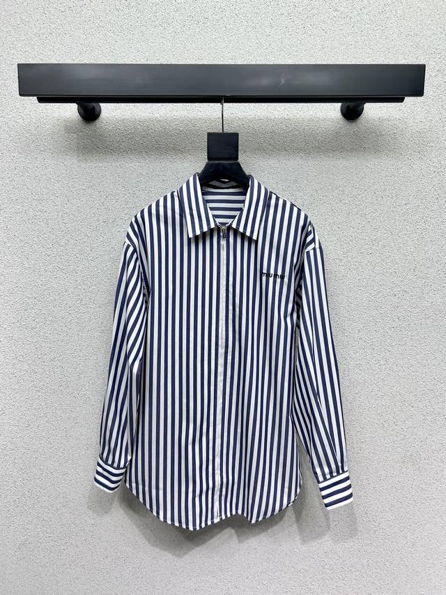 Miu's striped zip-up shirt is classic and stylish, perfect for any style. Made w