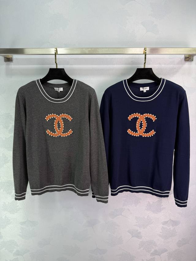 Chane*'s latest Spring/Summer 2025 collection! This contrasting logo pullover sw