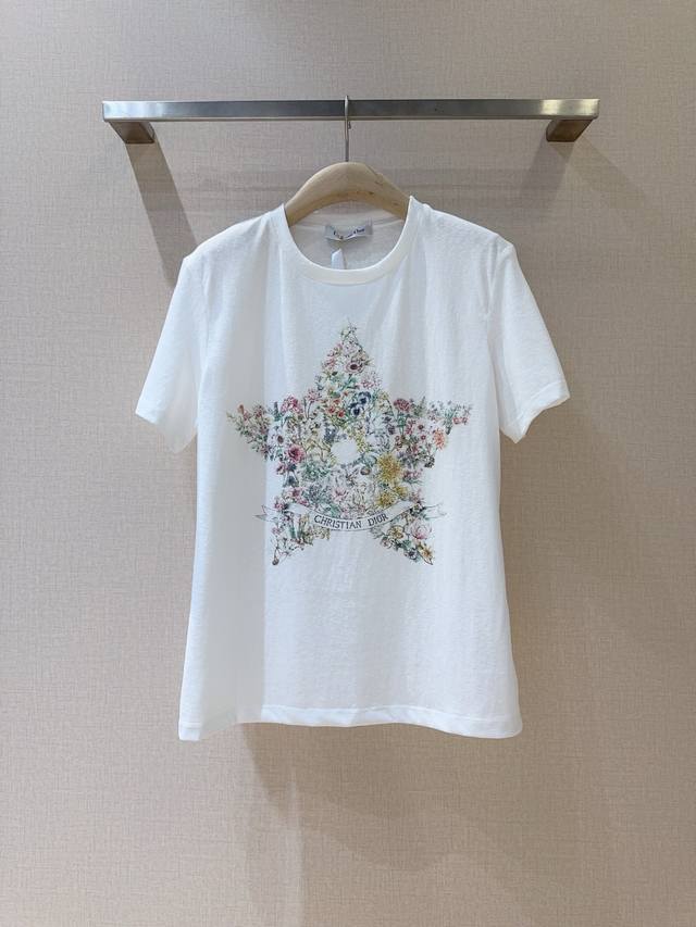 Dior's latest offering, highly recommended. Crafted from white cotton and linen,