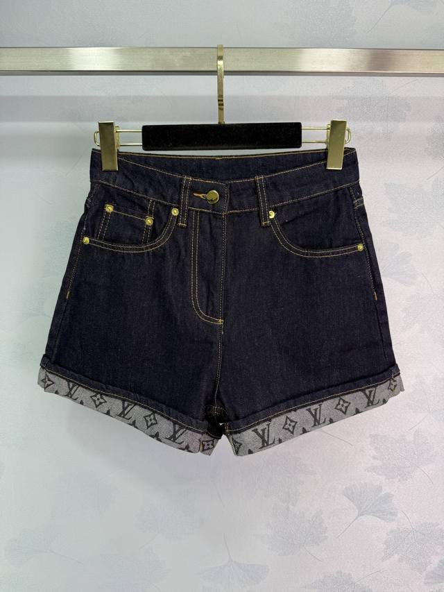 Lou 25's new early fall collection of denim shorts with a cuffed hem and monogra