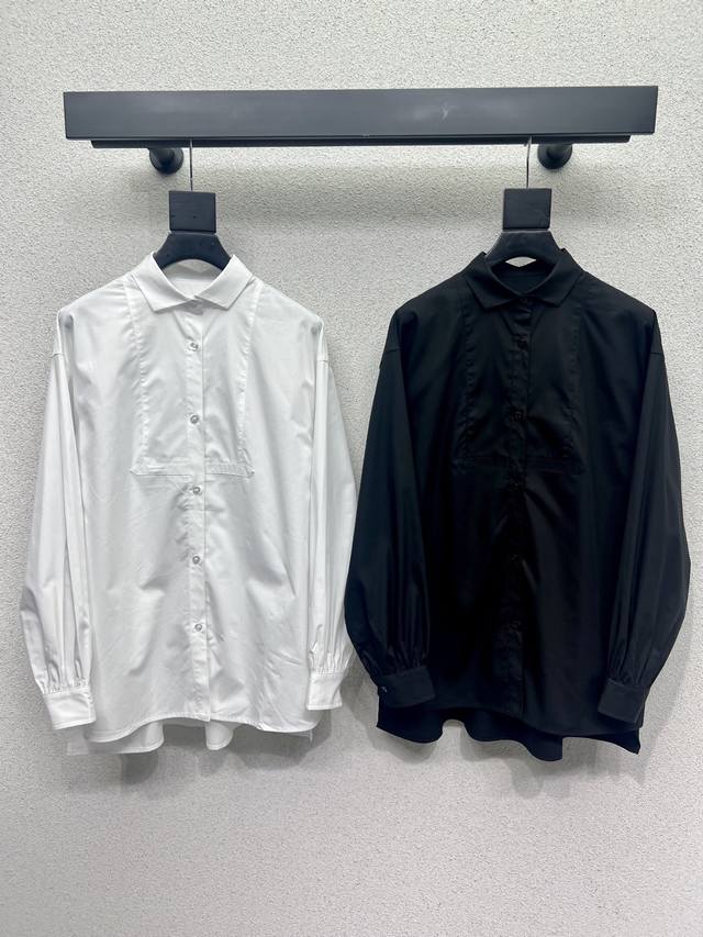 Loewe's leather-labeled shirt is stylish, understated, and luxurious! The versat