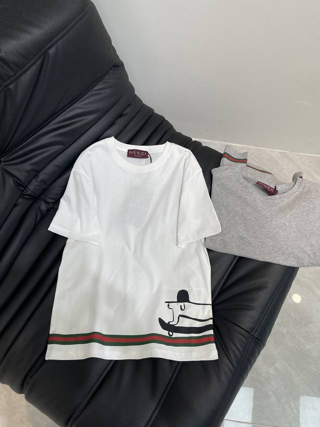 Gucc*'s new Spring/Summer 25 playful printed crew-neck short-sleeved T-shirt | E