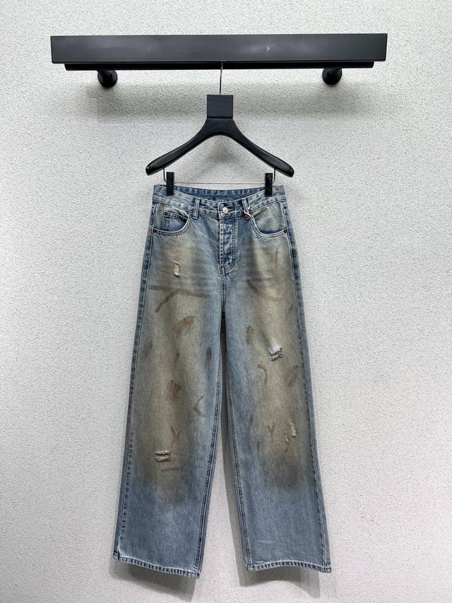 Ac* Distressed, ripped jeans with leather pockets on the back. This Sun Yi style