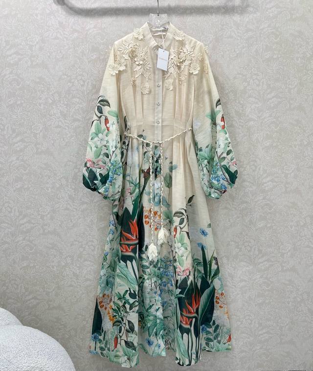sleeves, and the waist is pleated and cinched. It comes with a custom braided wa