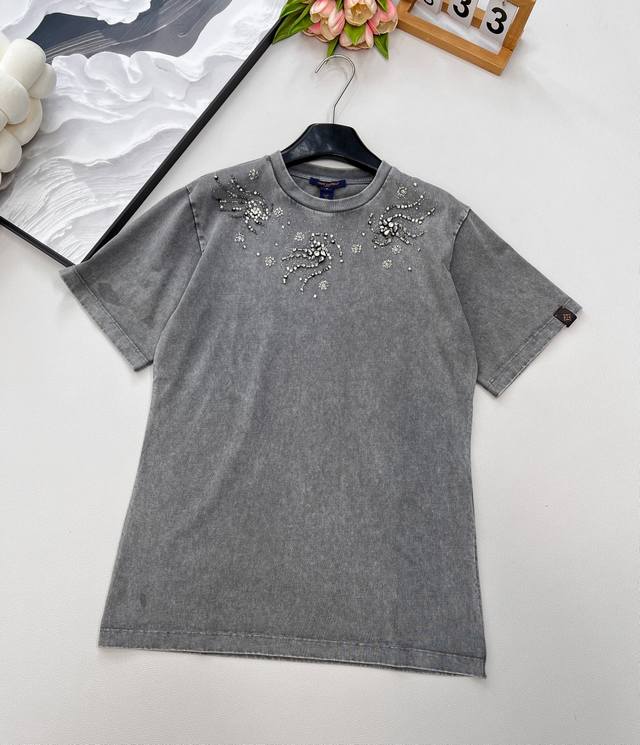 Louis Vuitton's new distressed grey short-sleeve top with diamonds takes summer