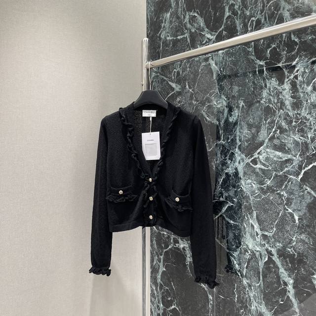 Chanel 25 Early Autumn New V-neck Hollow Wave Lace Knit Cardigan The hollow wave