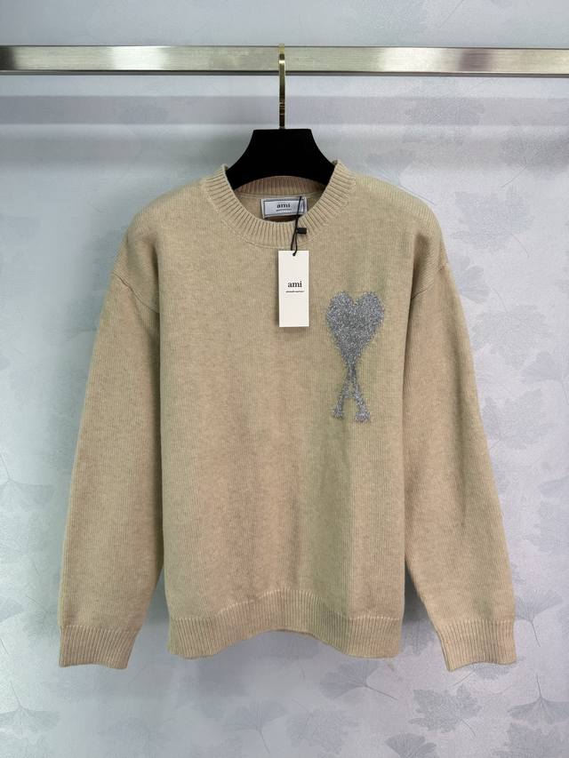 Ami*25 Early Fall Collection Heart Round Neck Knit Top features a classic silver