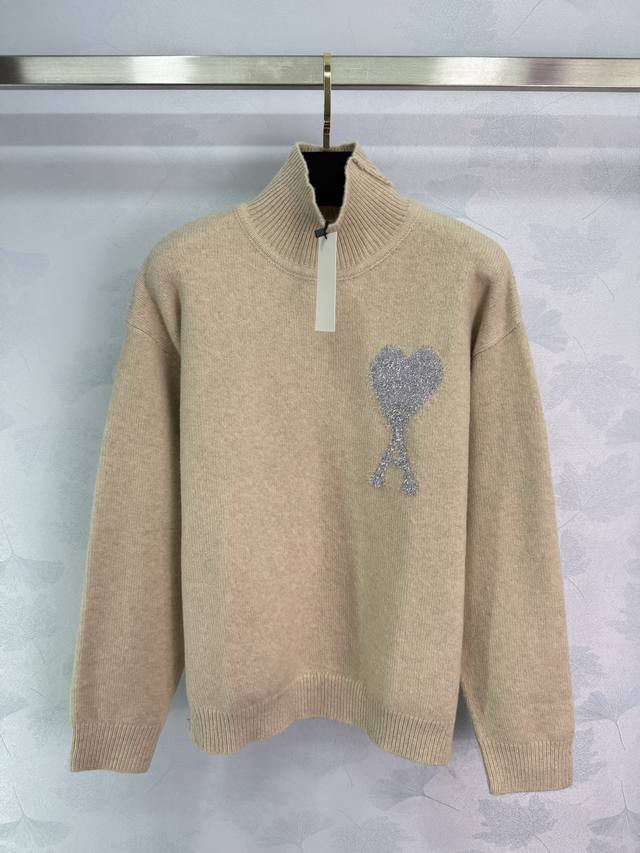 Ami*25 Early Fall Collection Heart Turtleneck Knit Top features a classic silver