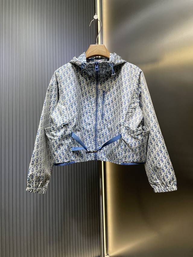 Dior's premium, original monogrammed jacket. This hooded jacket features gold Ob