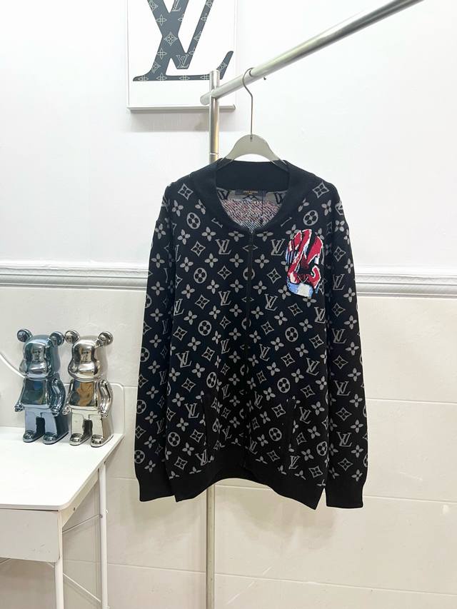 Style R032 Louis Vuitton wool knit cardigan jacket. The brand logo is outlined w