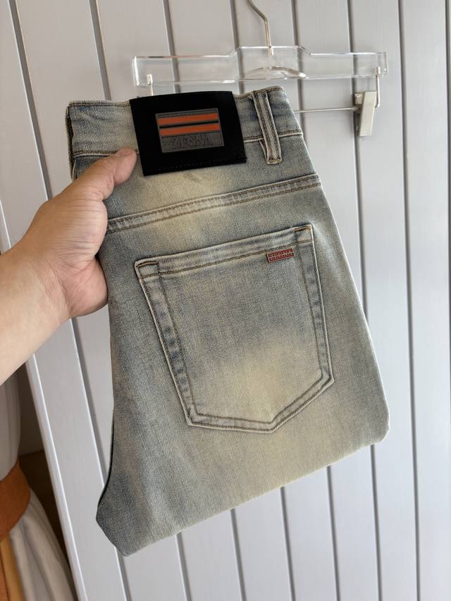 A pair of super stylish jeans, made of custom-made original washed denim fabric,