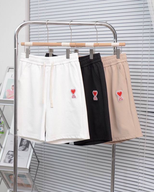 Ami Paris classic three-color casual shorts with a heart embroidered logo. These