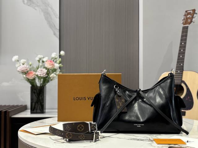 All-steel hardware with matching box. Carryalldark Medium Handbag. This Carrvall