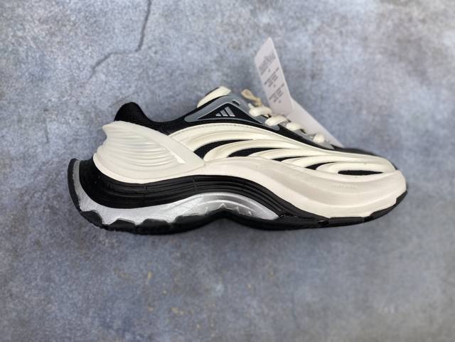 Adidas Xlg Mtw White and Black The design blends retro and modern styles. The up