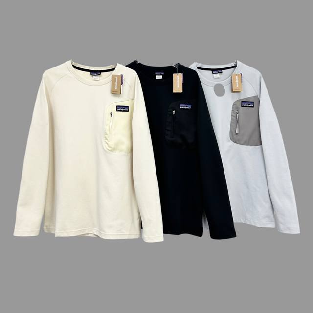 Patagonia half-zip, long-sleeved, base layer, with taped pockets and a stand-up