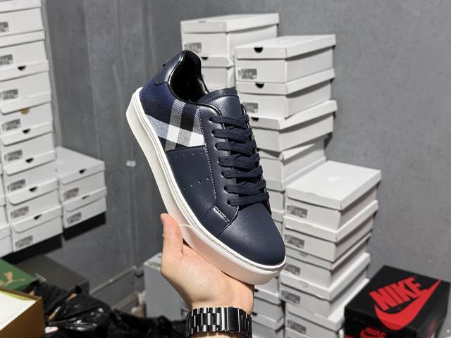 Burberry checkered sneakers in classic striped checkered patterns. Embossed wit