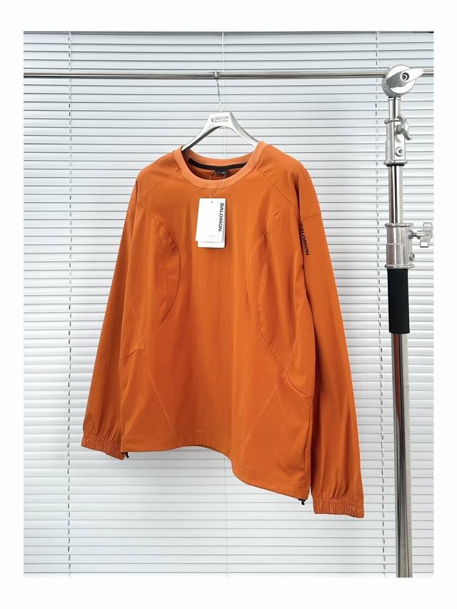 Salomon functional sweatshirt in orange, charcoal, and dark gray, size S-XL. Als