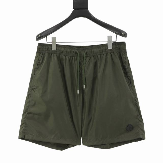 Moncler Classic Pocket Logo Woven Shorts DDD. These shorts are made of quick-dry