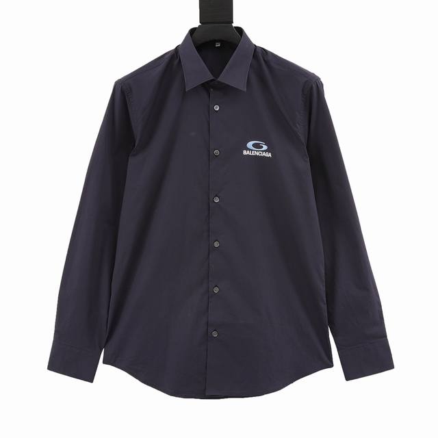 Balenciaga White Shirt with Embroidered Logo This cotton shirt reinterprets a ti