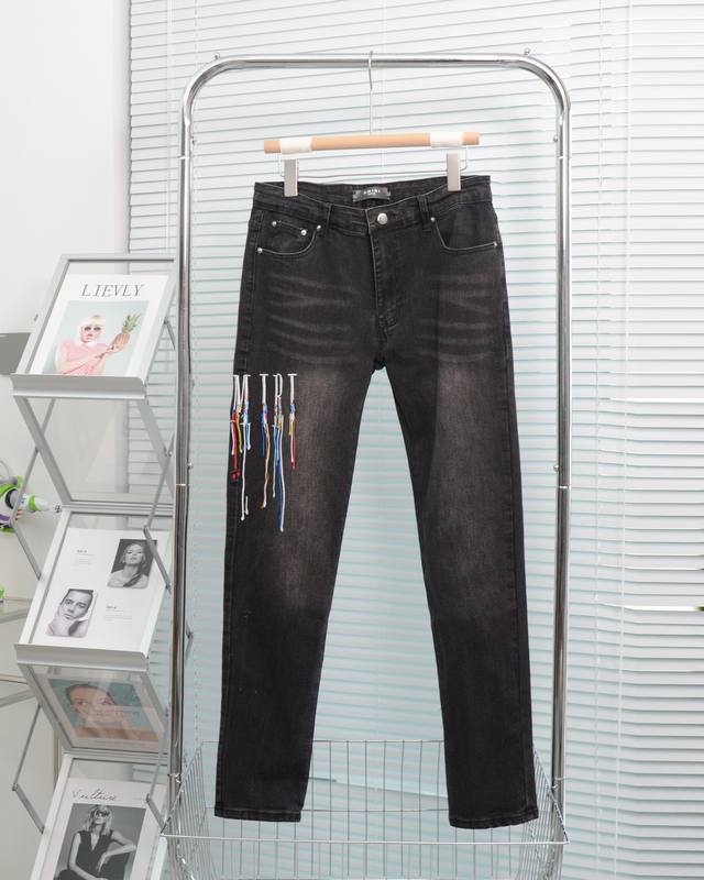 Offers heavyweight Amiri tassel-embroidered high-street jeans. Slim-fit, stretc