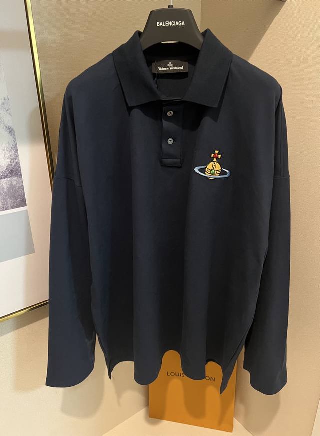 Navy blue colorway, sizes SML, in stock. * Queen Mother Saturn Embroidered Polo