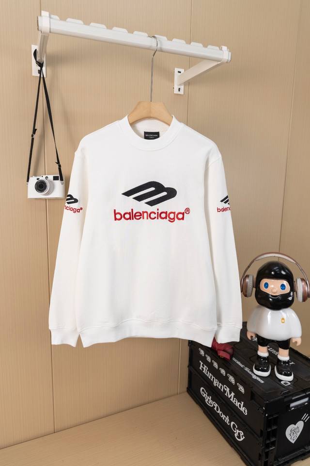 Photos: Balenciaga 3M embroidered crewneck sweatshirt in black and white. Made f