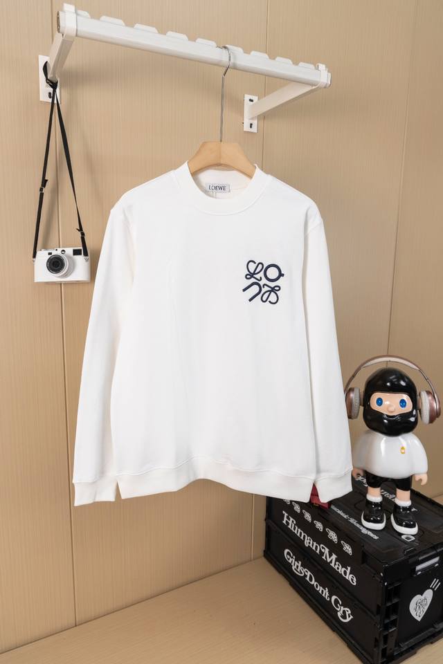 Photos: Loewe crewneck sweatshirt with large front and back logo embroidery. Mad
