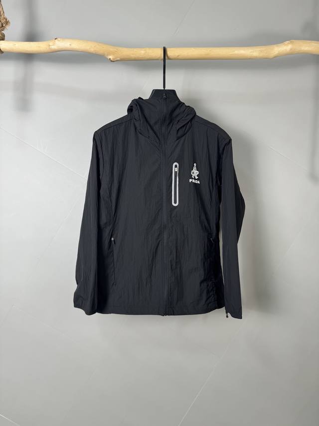 Prada's new Spring/Summer 2025 men's sun protection jacket features a custom-mad
