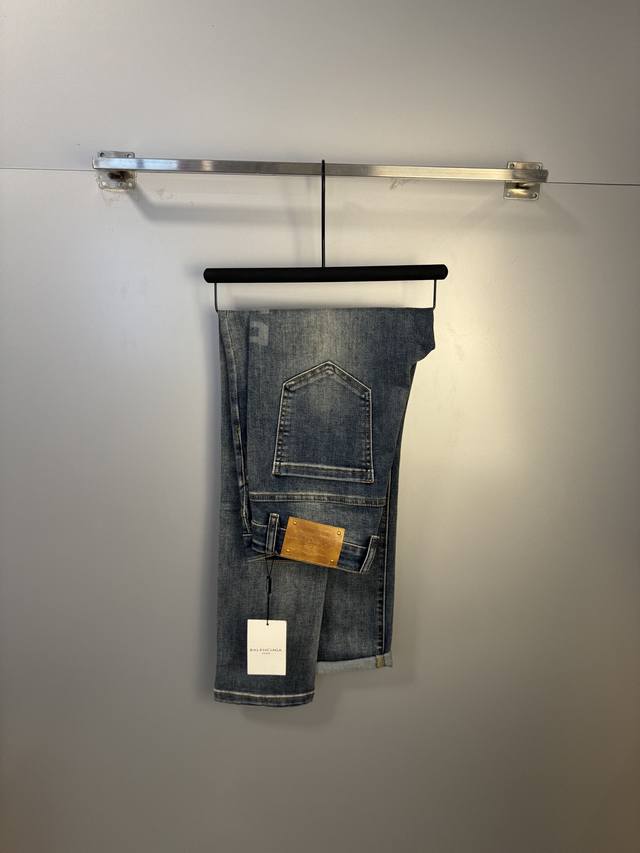 Balenciaga men's denim jeans, featuring the official brochure and poster look!