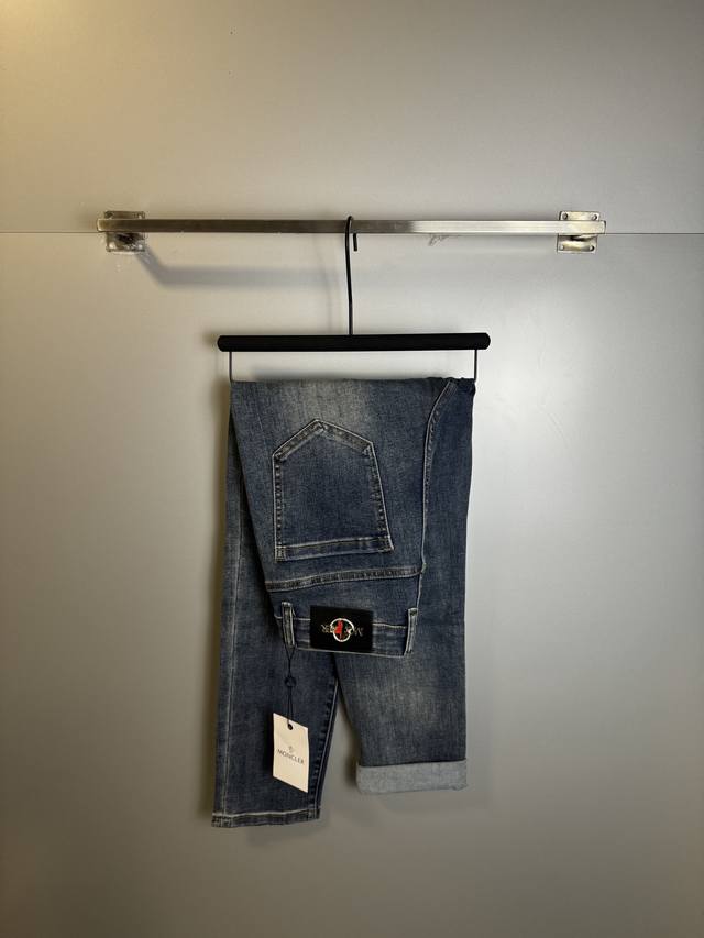 High-quality, next-day shipping Moncler men's denim jeans, featuring the offici