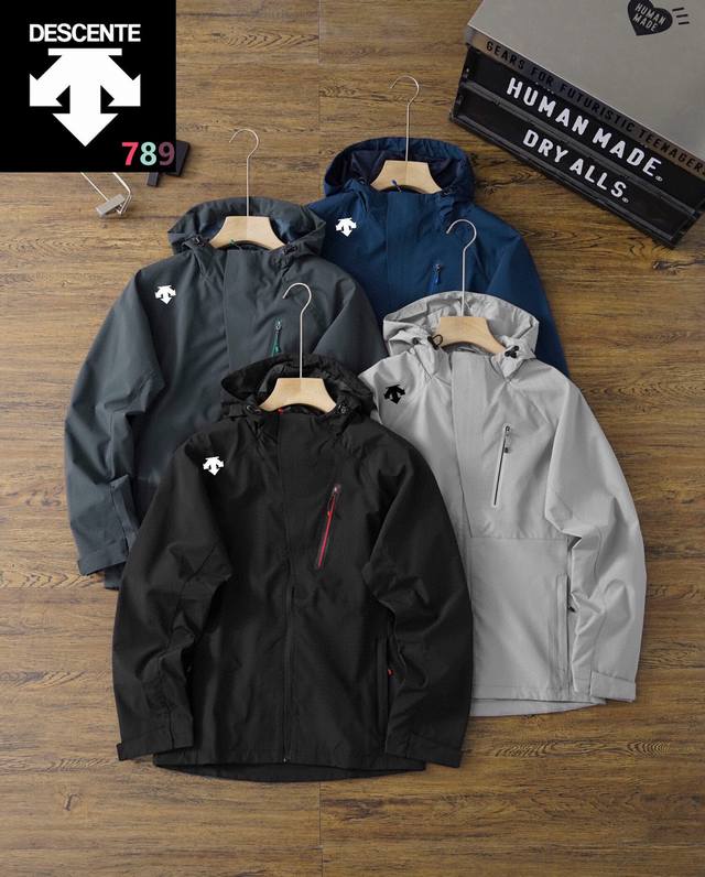Descente's popular laminated jacket. Colors: black, denim blue, dark green, ligh