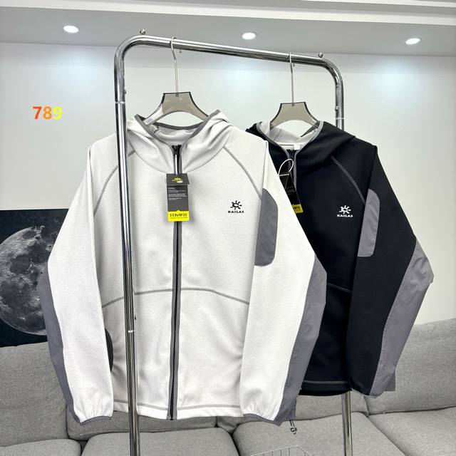 Kailas Zippered Hooded Sport Patchwork Sweatshirt Jacket features a body aesthet
